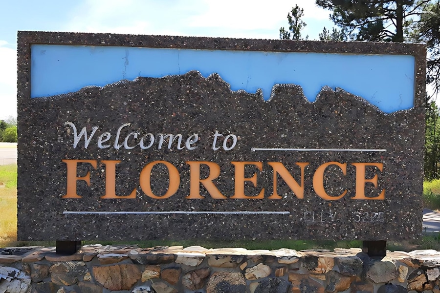 image of the welcome to florence sign in florence, mt