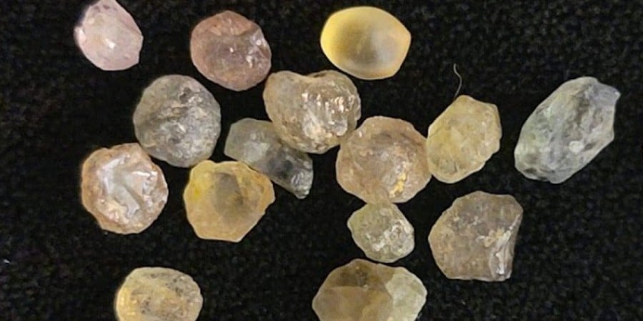 image of a group of raw montana sapphires