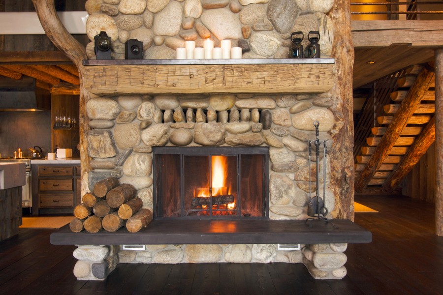Image of a stone fireplace in a Montana Lodge