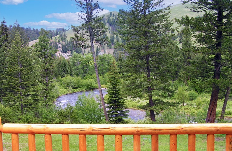 image of the east fork of the bitterroot river from a cabin patio