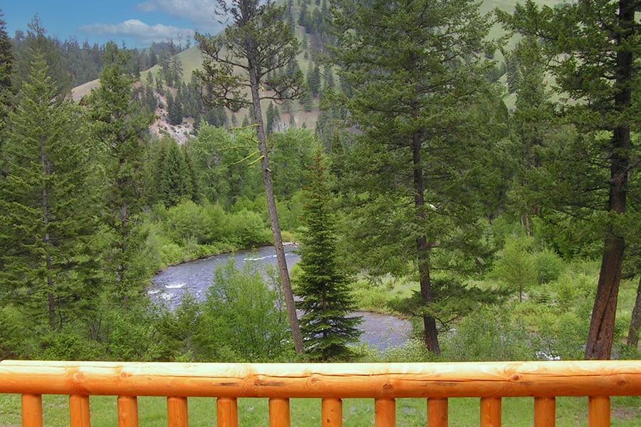image of the east fork of the bitterroot river from a cabin patio